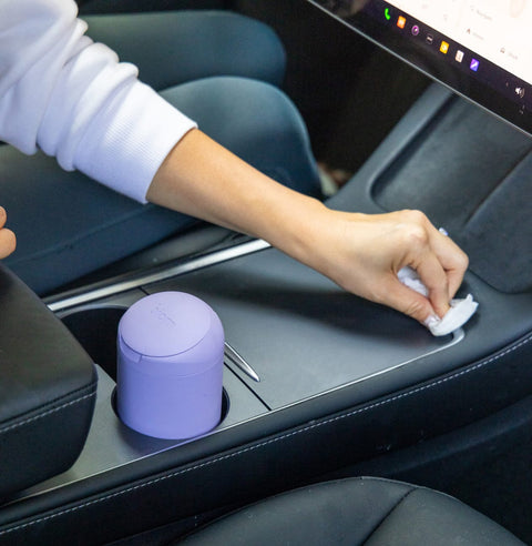 Woman wiping center console